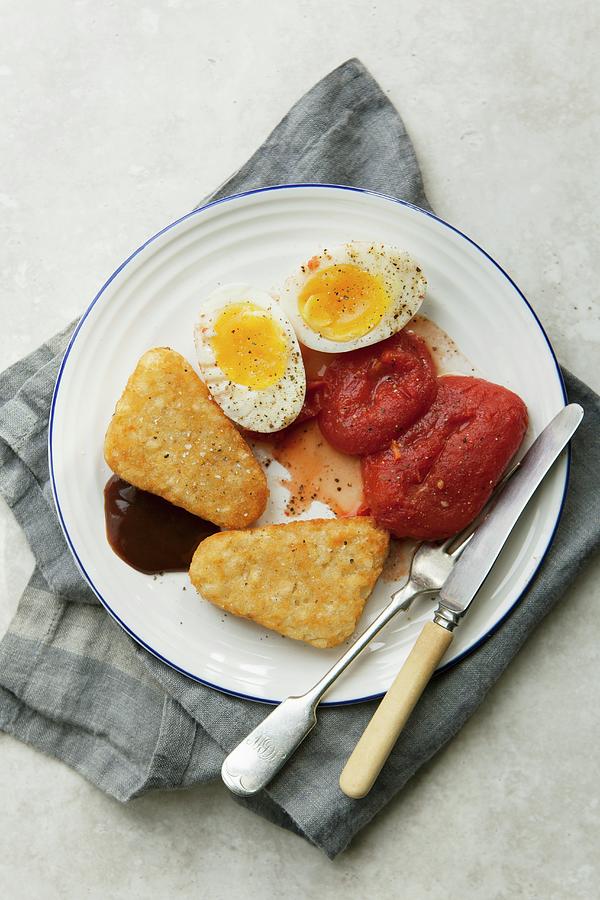 A Vegetarian English Breakfast With Hash Browns, Tomatoes And Eggs Photograph by Stacy Grant