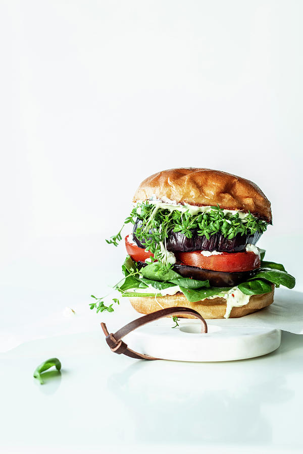A Veggie Burger Made With Aubergines, Tomatoes, Spinach And Cress Photograph by Simone Neufing