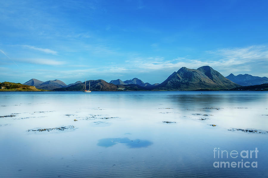 A very still Sound of Raasay and the mountains of Skye Photograph by Phill Thornton