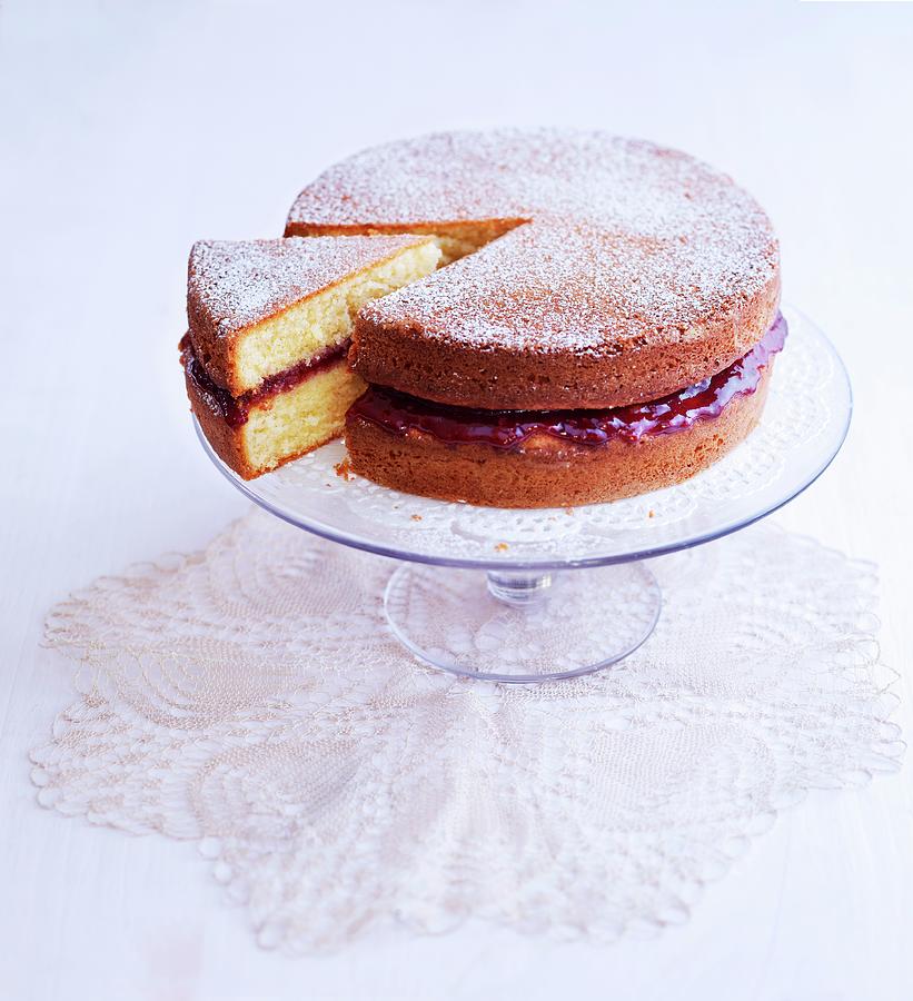 A Victoria Sponge Cake Dusted With Icing Sugar Photograph by Amlie Roche