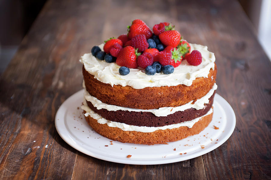 A Victoria Sponge Cake With Summer Berries Photograph by William Reavell