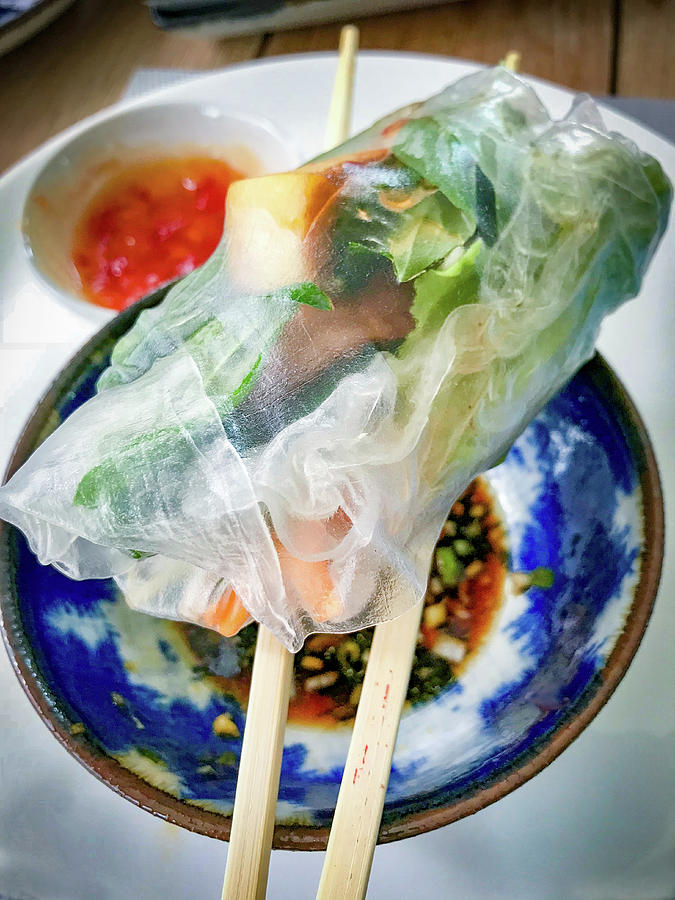 A Vietnamese Spring Roll On Chopsticks Photograph by Eising Studio