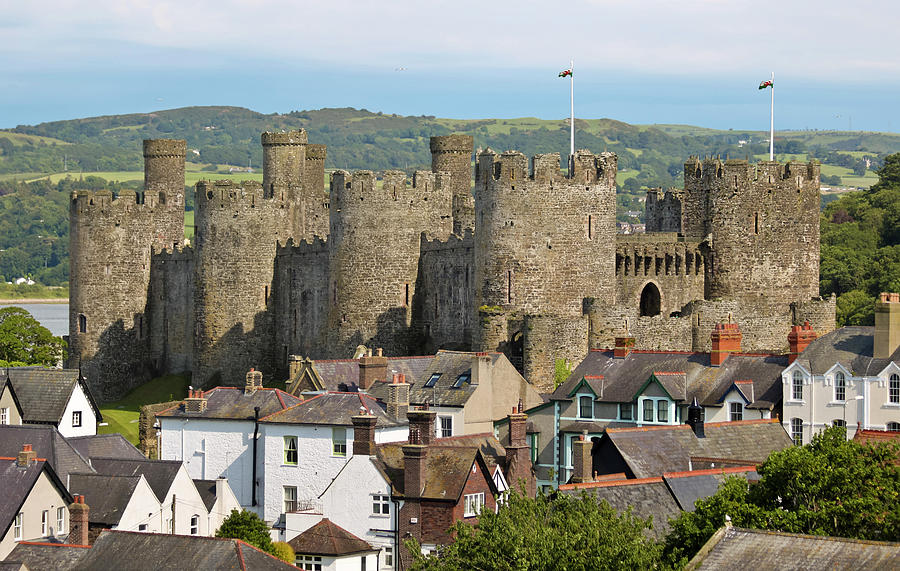 Castle Photograph - A View of Conwy Castle Rising Above the Rooftops of Conwy, Wales by Derrick Neill