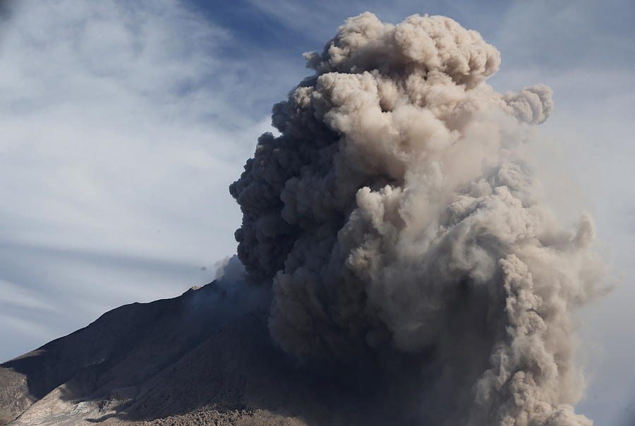 A View of the Mount Sinabung Volcano Photograph by Beawiharta ...