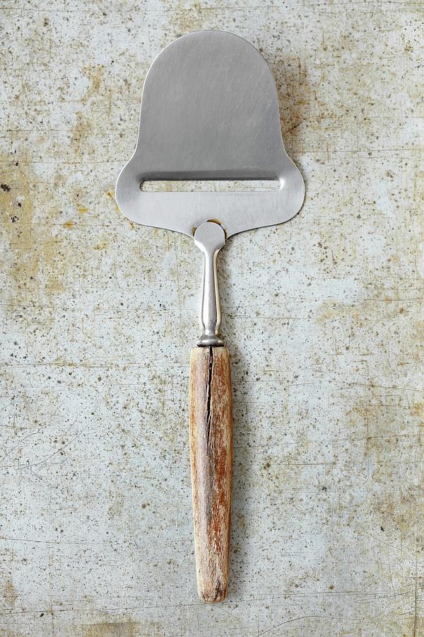A Vintage Cheese Cutter Photograph by Rua Castilho