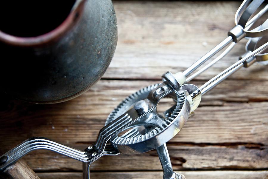 A Vintage Hand Whisk Next To A Clay Jug detail Photograph by George Blomfield
