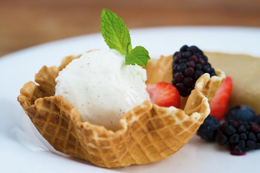 A Wafer Basket With Vanilla Ice Cream And Berries Photograph by Kapoor, Nitin