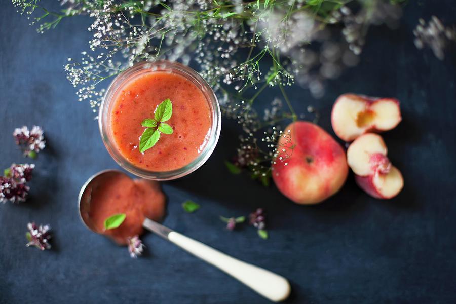 A Watermelon And Peach Smoothie In A Glass Photograph by Alicja Koll
