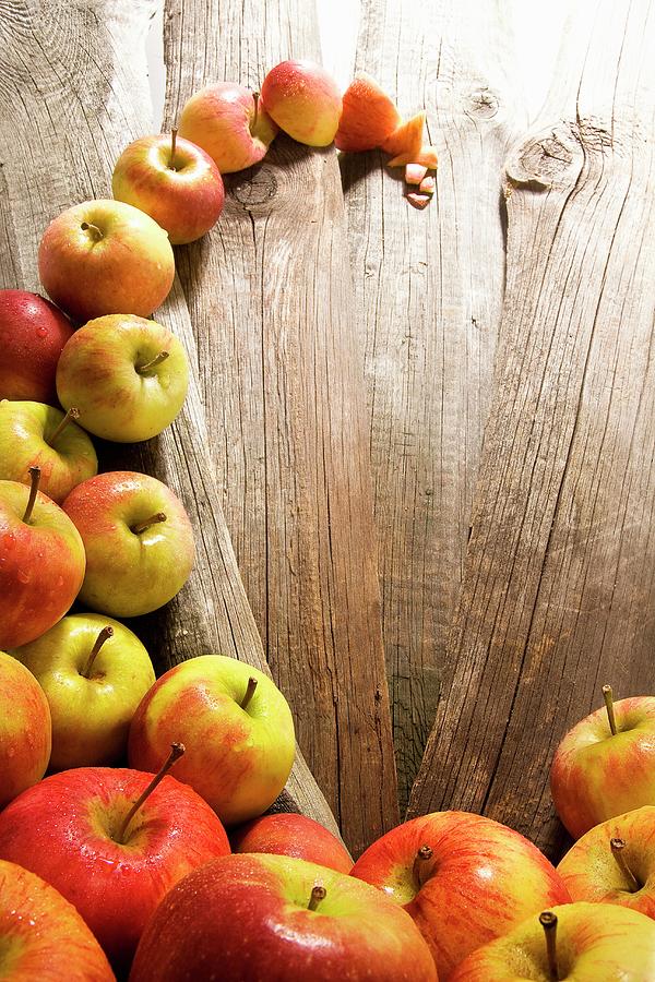 A Wave Of Bedewed Apples elstar, Jonagold On Rustic Wood Boards Photograph by Schenk, Hendrik