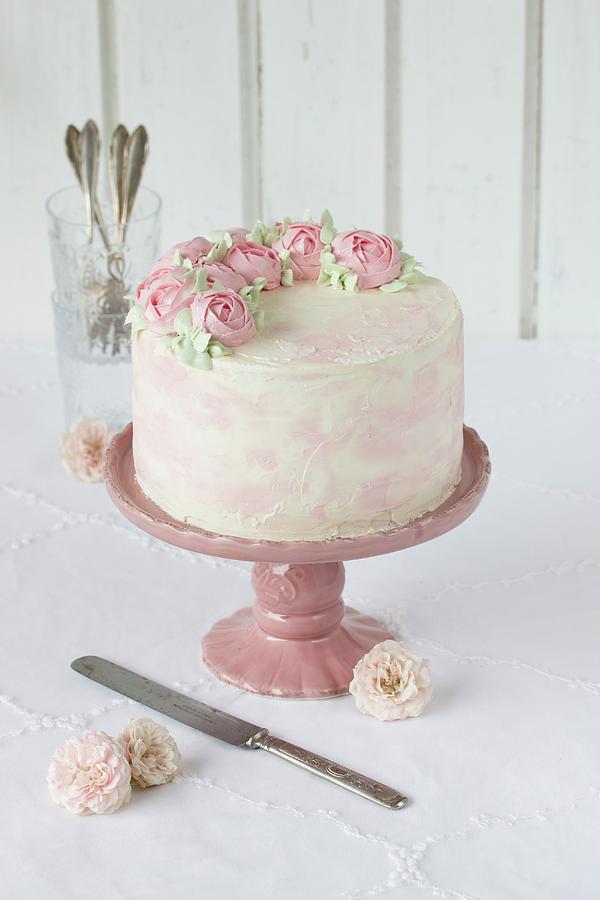 A Wedding Cake With Buttercream Roses Photograph by Emma Friedrichs