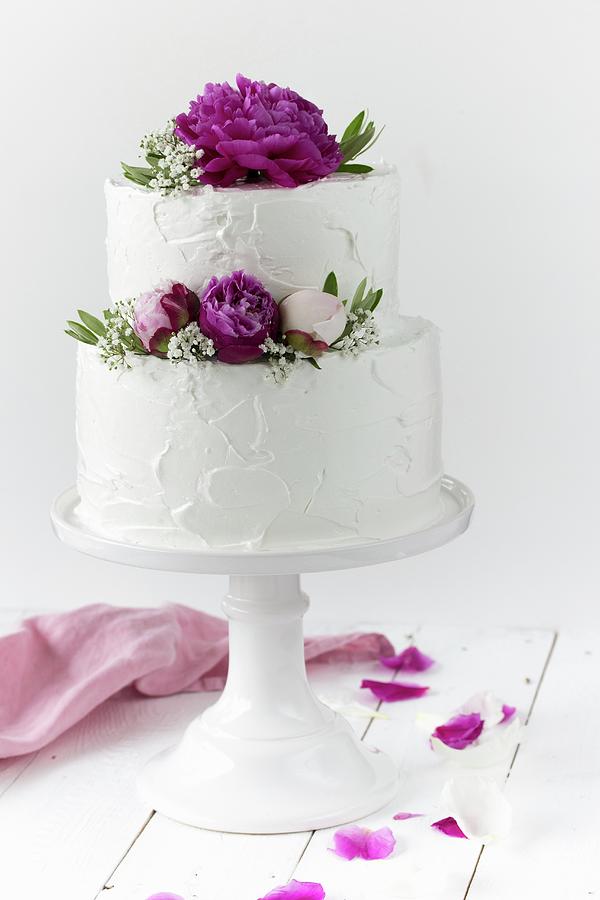 A Wedding Cake With Spring Roses Photograph by Emma Friedrichs