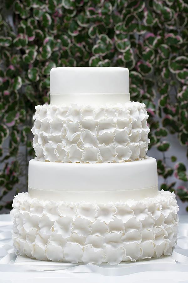 A White, Four-tier Wedding Cake Photograph by Lydie Besancon