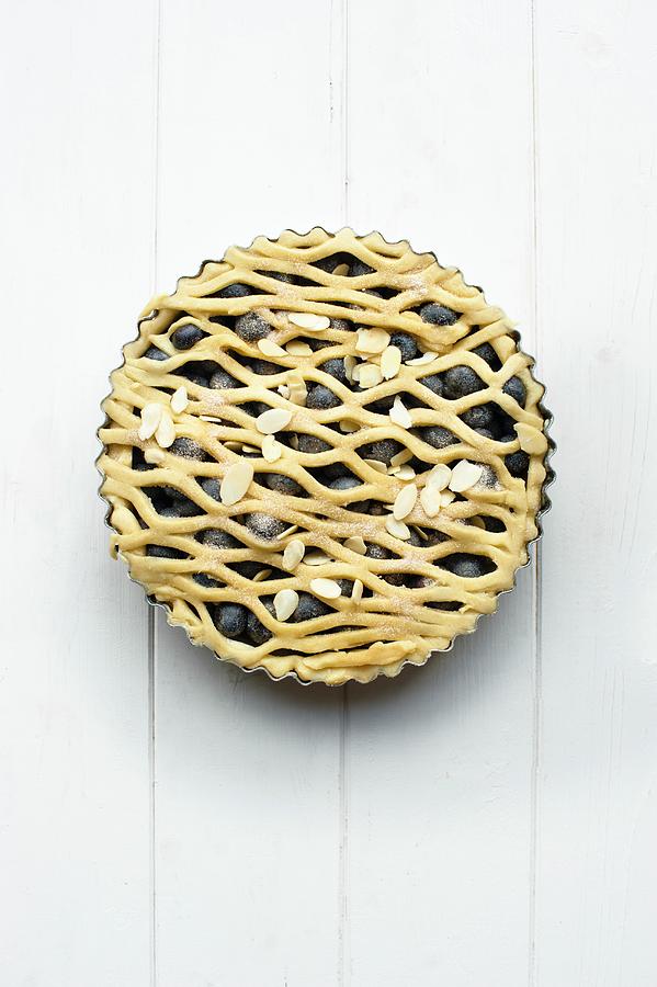 A Whole Blueberry Pie With A Lattice Top In A Baking Tin Photograph by Magdalena Hendey