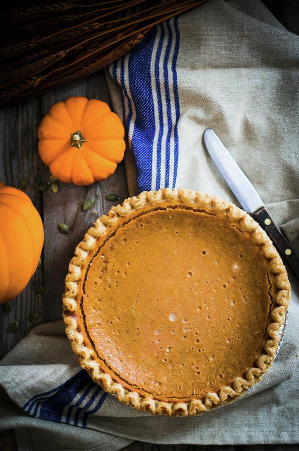A Whole Pumpkin Pie seen From Above Photograph by Alena Haurylik
