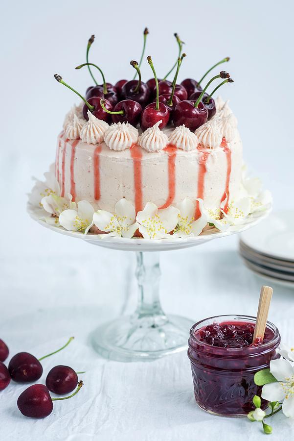 A Whole Victoria Sandwich Cake With Fresh Cherries Photograph by Lucy Parissi