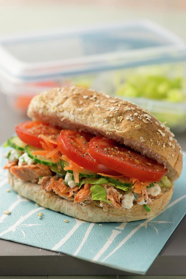 A Wholemeal Roll With Salmon Salad And Tomatoes Photograph by Jonathan Short
