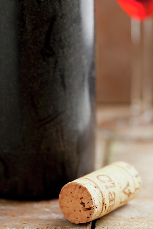 A Wine Cork With An Old Wine Bottle Photograph by Shawn Hempel