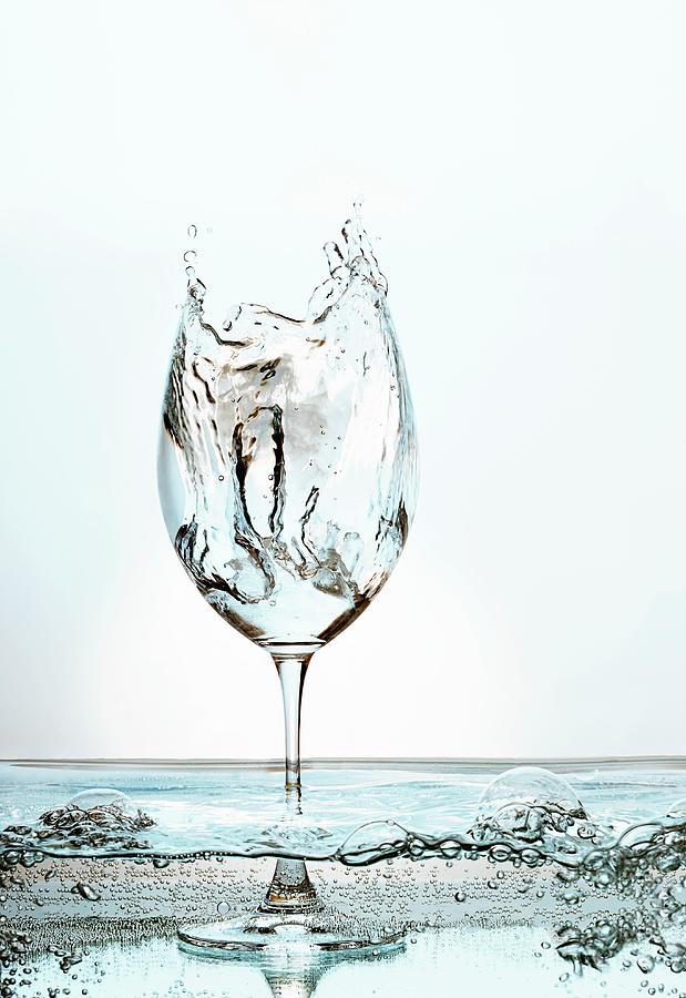 A Wine Glass Filled With Sparkling Water Photograph by Vetter, Misha