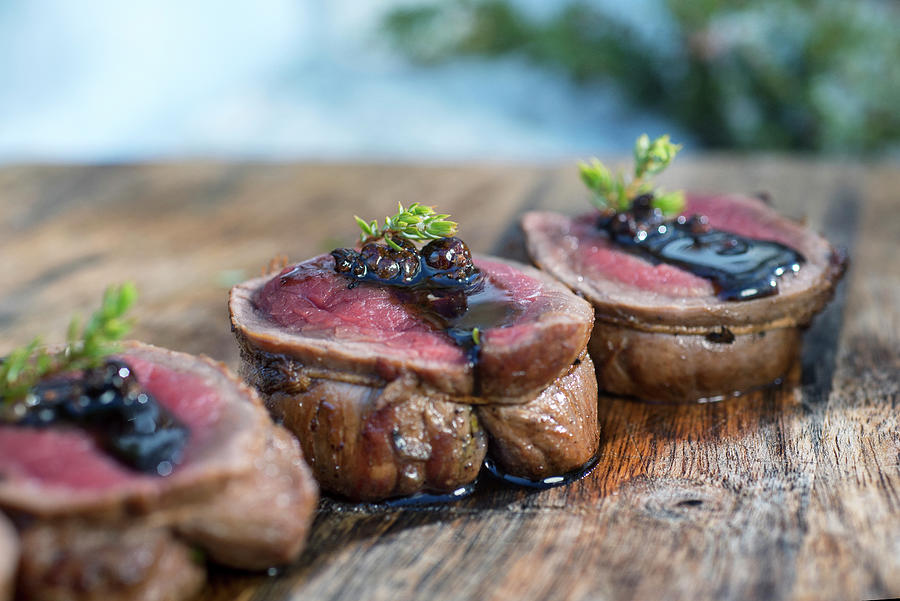A Winter Barbecue: Sliced Elk Roulade On A Wooden Board norway Photograph by Lode Greven Photography