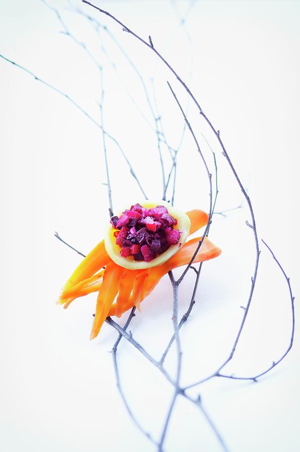 A Winter Salad In A Pastry Dish On A Bed Of Carrot Strips Photograph by Jan Prerovsky