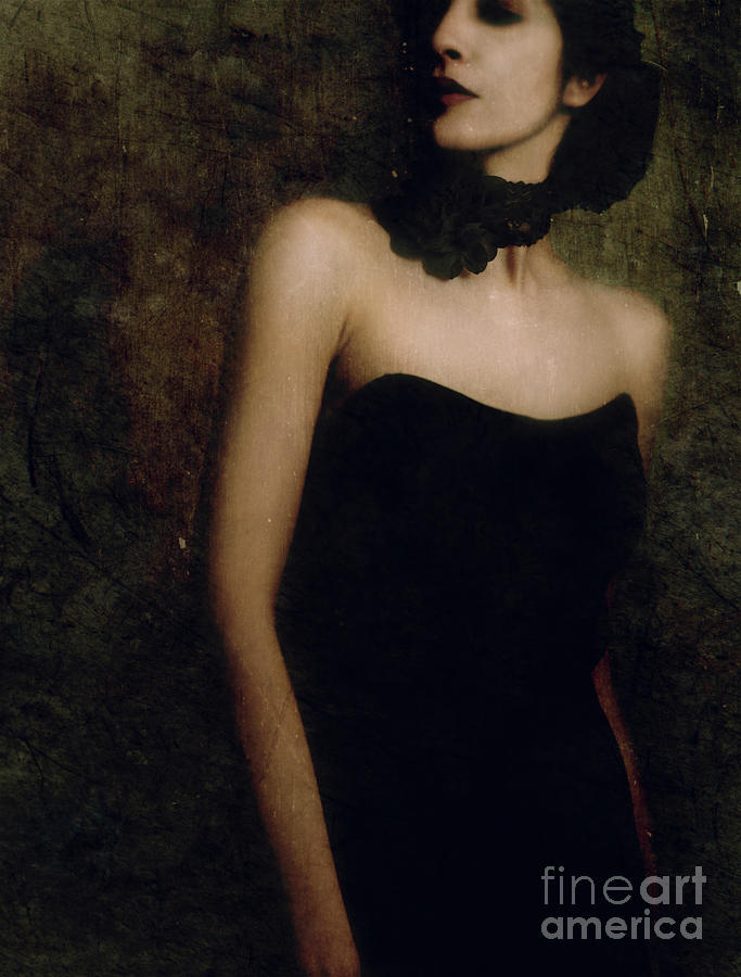 A woman wearing a black dress and necklace Photograph by Jelena Jovanovic