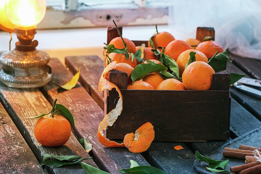 A Wooden Crate Of Clementines Photograph by Natasha Breen