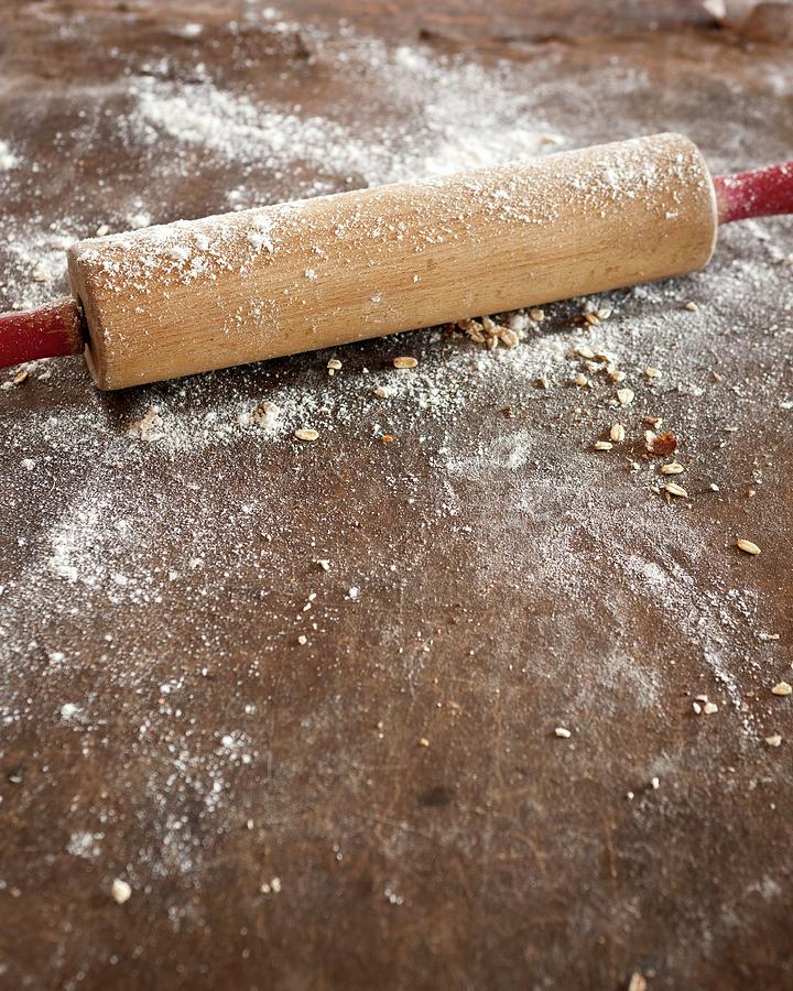 A Wooden Rolling Pin Dusted With Flour Photograph by Great Stock!