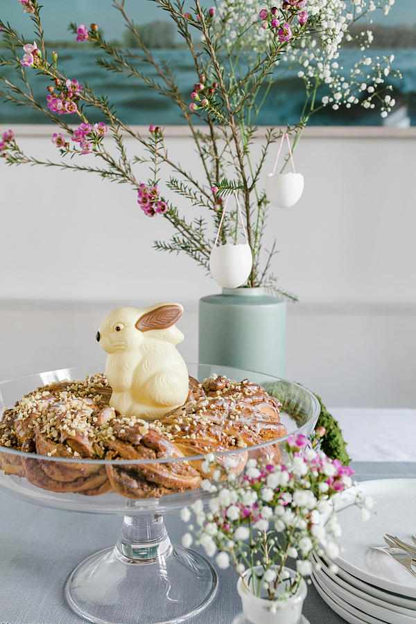 A Yeast Dough Wreath With A White Chocolate Easter Bunny Photograph by Sabine Steffens