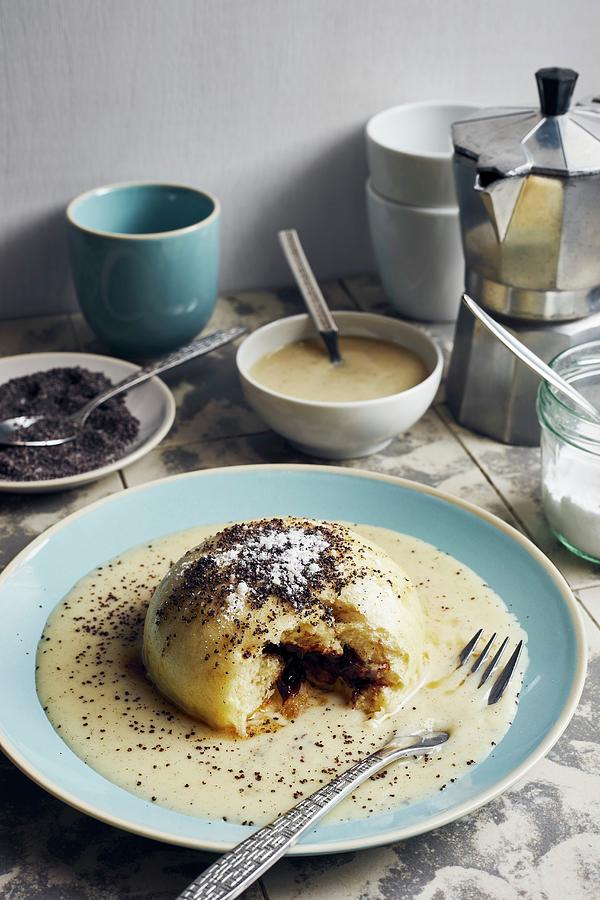 A Yeast Dumpling With Brown Butter, Poppy Seeds, And Vanilla Sauce Photograph by Ulrike Emmert