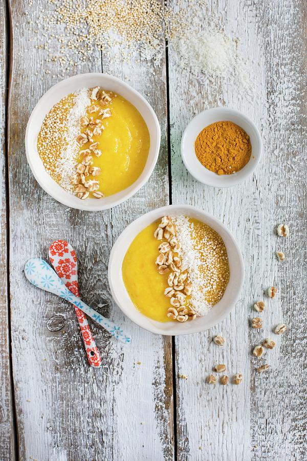 A Yellow Smoothie Bowl With Mango, Pineapple, Banana, Turmeric And Cereal Pops Photograph by Tina Engel