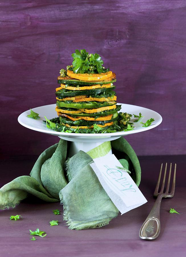 A Zucchini And Sweet Potato Tower With A Card Photograph by Brbel Bchner