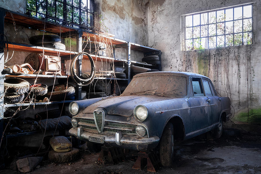 Abandoned Car in Garage Photograph by Roman Robroek