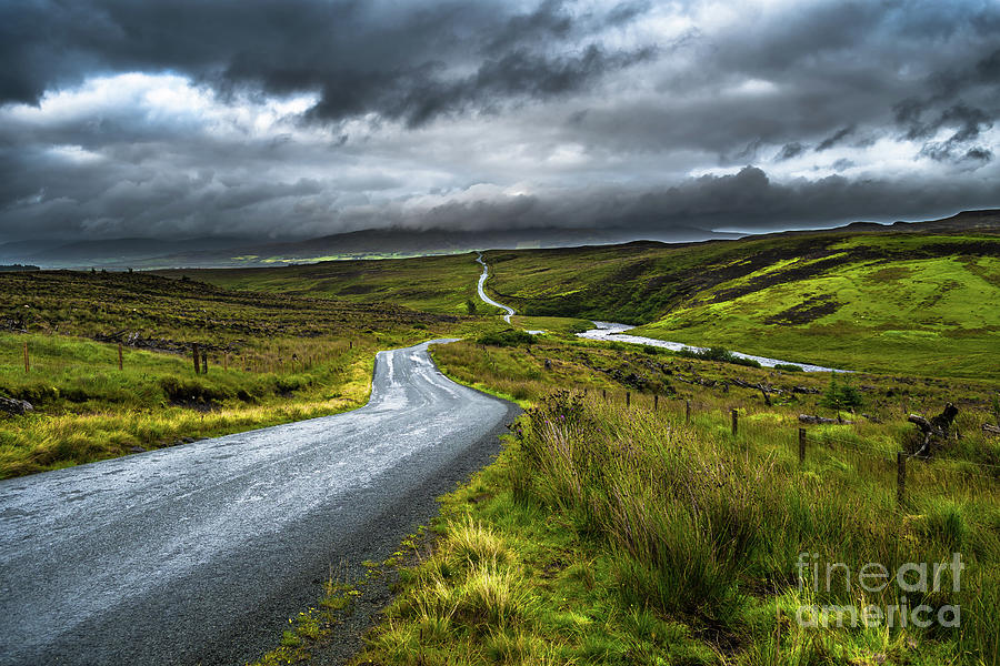 Abandoned Single Track Road Through Scenic Hills On The Isle Of Skye In Scotland Photograph by Andreas Berthold