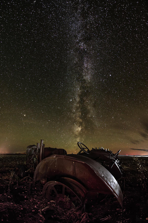 Abandoned Tractor headed towards Milky Way Photograph by Peter Herman