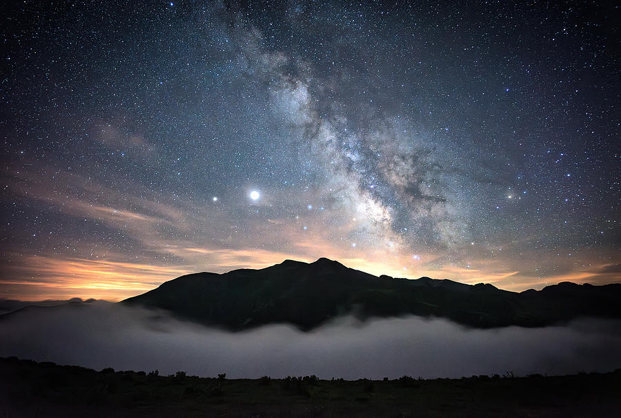 Above The Clouds, Under The Stars Photograph by Carmenvillar