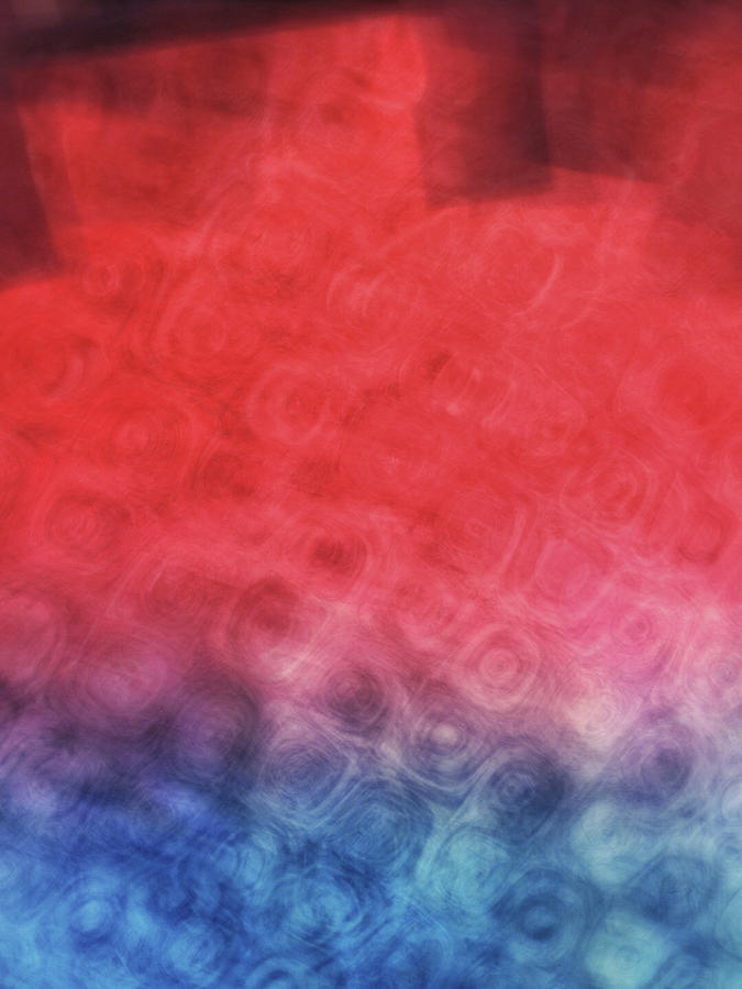 Abstract of patterns of blue, red and pink colors blurred and blended together Photograph by Teri Virbickis