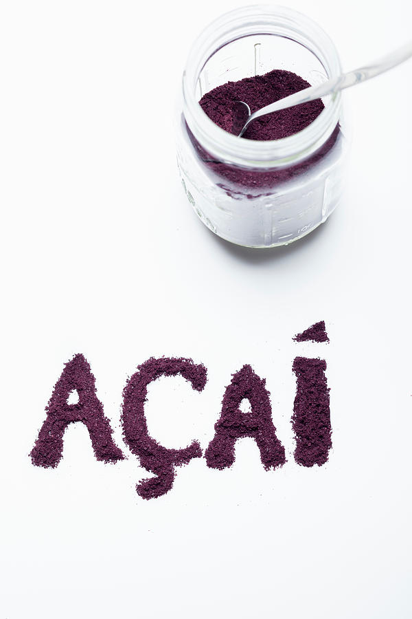 Acai Berry Powder: In A Glass Jar And Lettered Against A White Background Photograph by Eising Studio
