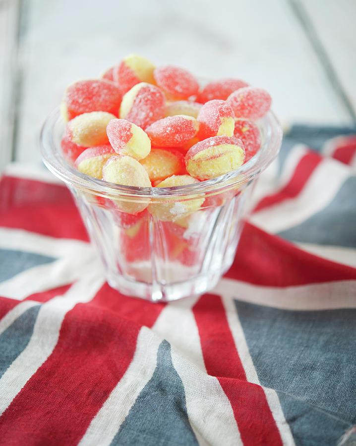 Acidulated Sweets And An English Flag Photograph by Cox