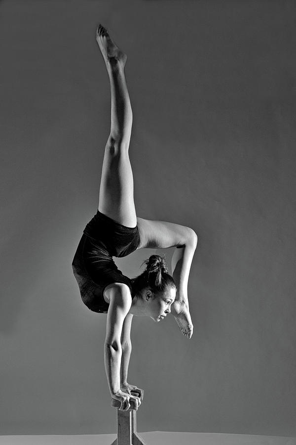 Acrobatic Gymnast In Gym On Blocks Photograph by Howard Ashton-jones Acrobatic Gymnast In Gym On Blocks Photograph by Howard Ashton-jones