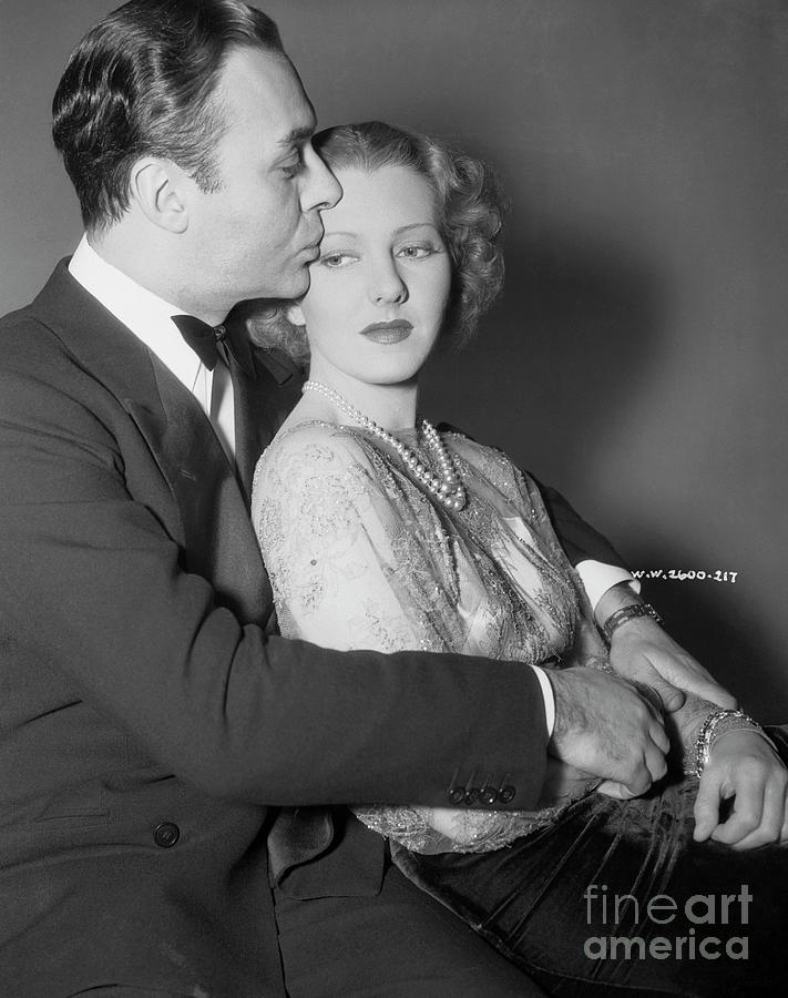 Actor Charles Boyer Hugging Actress Photograph by Bettmann