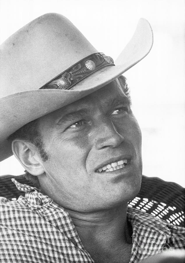 Actor Charlton Heston Wearing A Cowboy Photograph by Bettmann