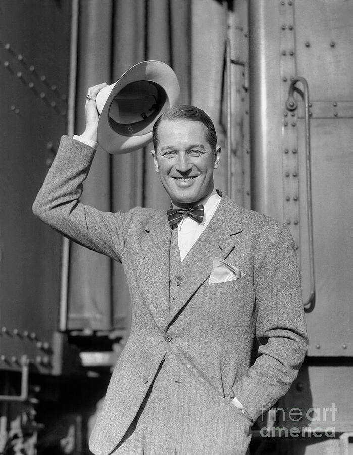 Actor Maurice Chevalier Removing Photograph by Bettmann