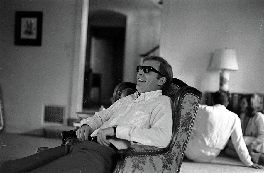 Actor Michael Caine Laughing In Los Photograph by Bill Ray