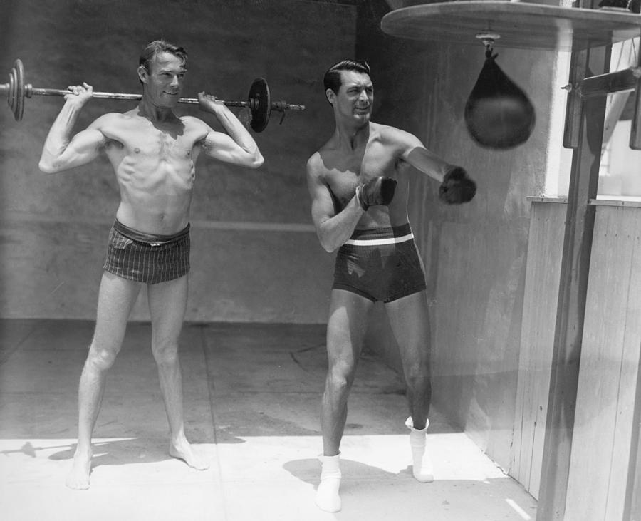 Actors Randolph Scott And Cary Grant Photograph by Bettmann