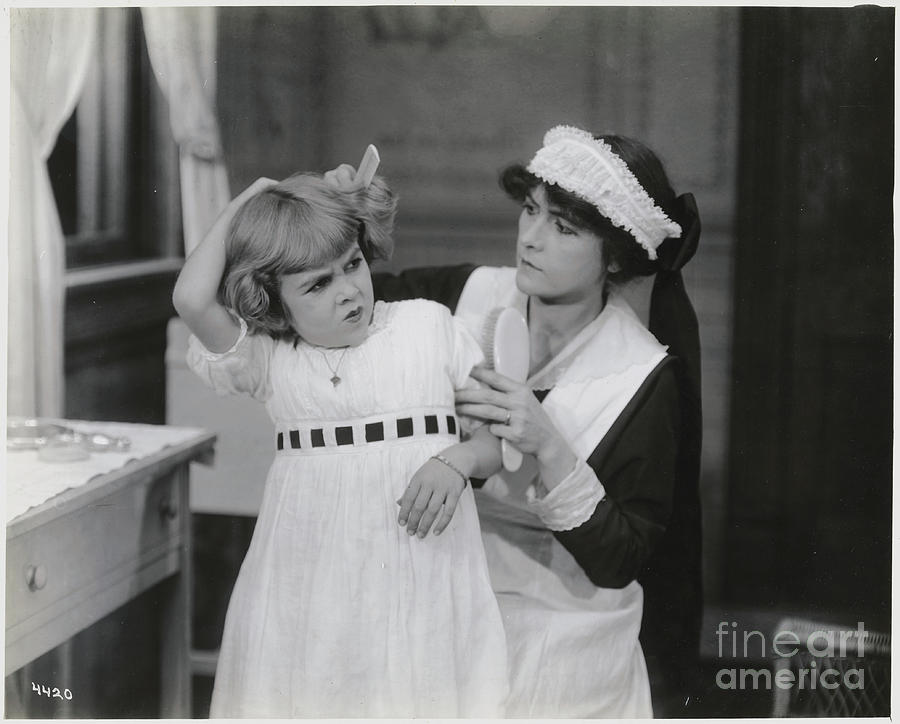 Actress As Maid Combing Mary Photograph by Bettmann