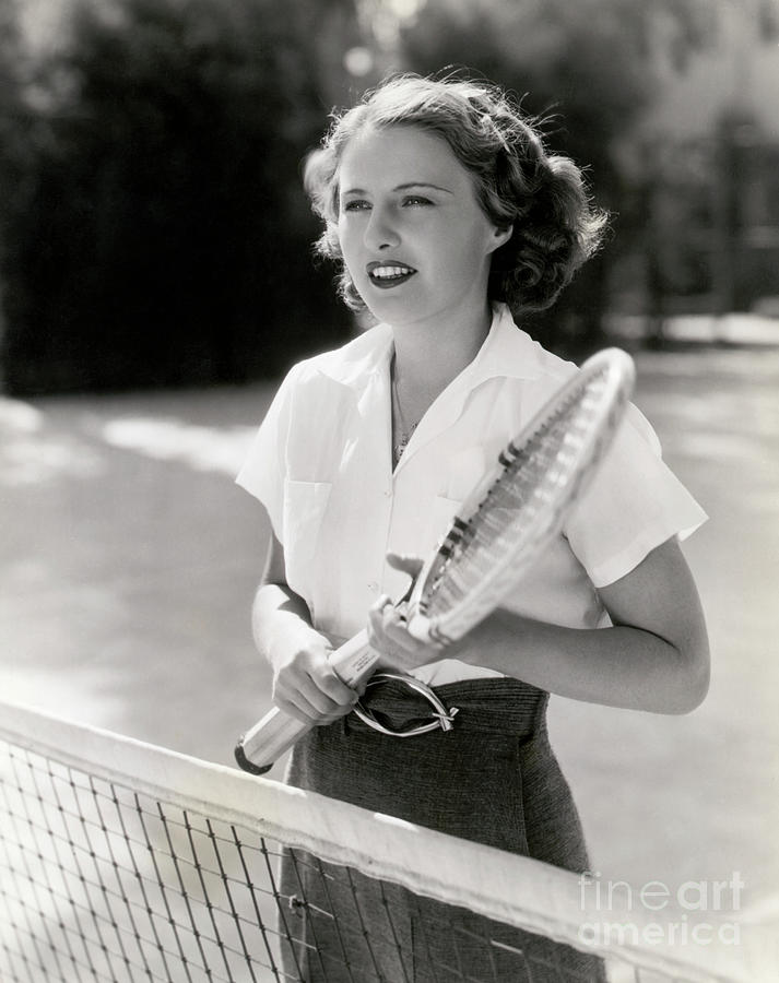 Actress Barbara Stanwyck Playing Tennis Photograph by Bettmann