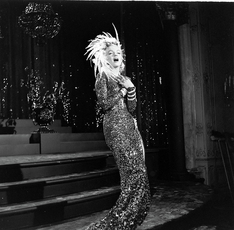 Actress Marilyn Monroe performing hot song and dance number in the movie  Photograph by Ed Clark