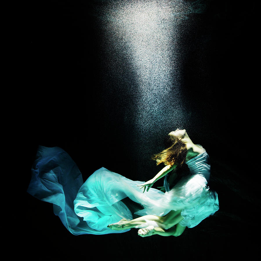 Adult Female Under Water In Flowing Photograph by Henrik Sorensen