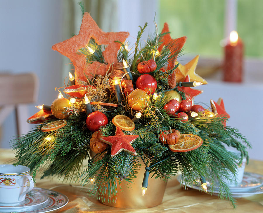 Advent Arrangement With Fairy Lights, Sisal Stars And Balls Photograph by Friedrich Strauss