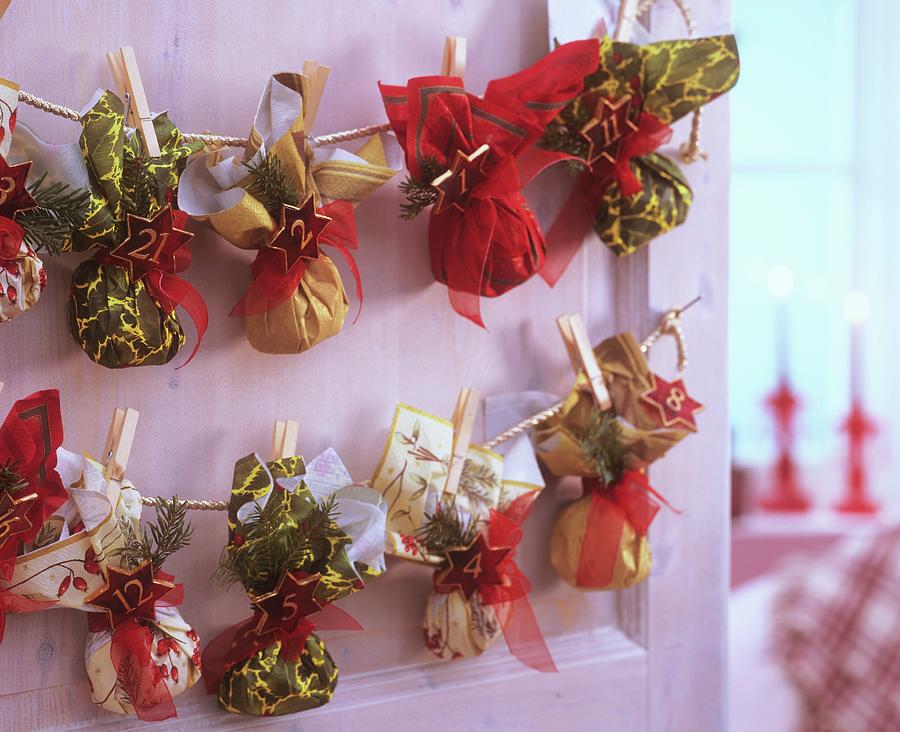 Advent Calendar With Small Bags Made From Napkins Photograph by Friedrich Strauss